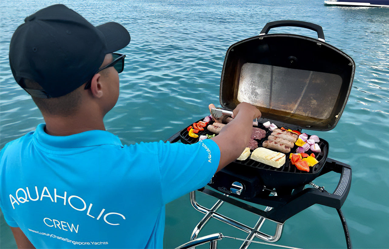 aquaholic crew cooking on BBQ