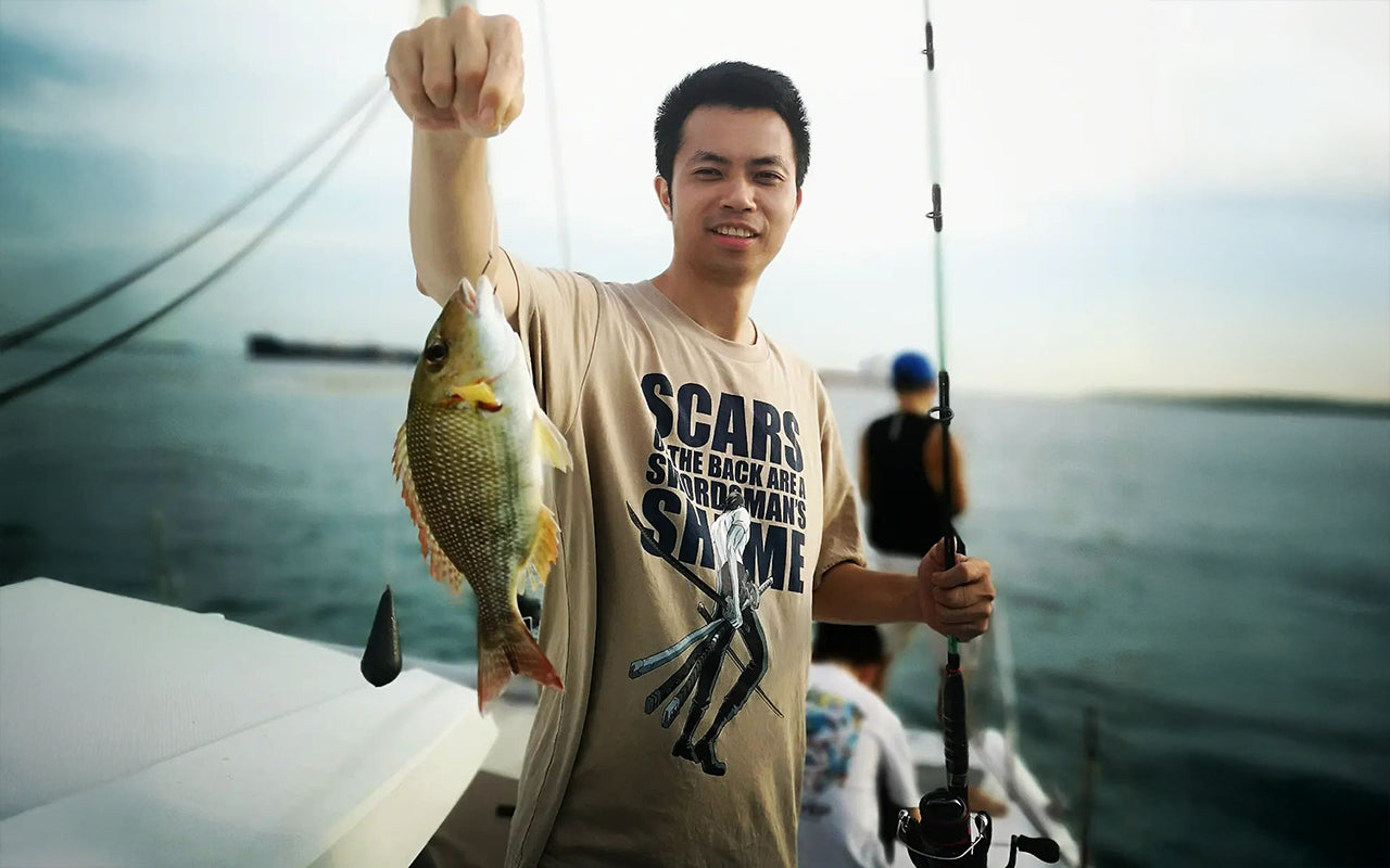catching a fish on AQUAHOLIC Yacht Charter