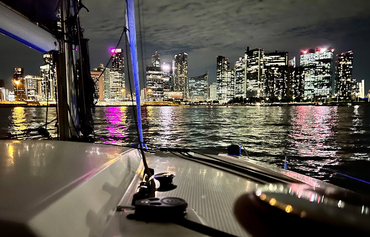 Singapore city skyline from bow of AQUAHOLIC