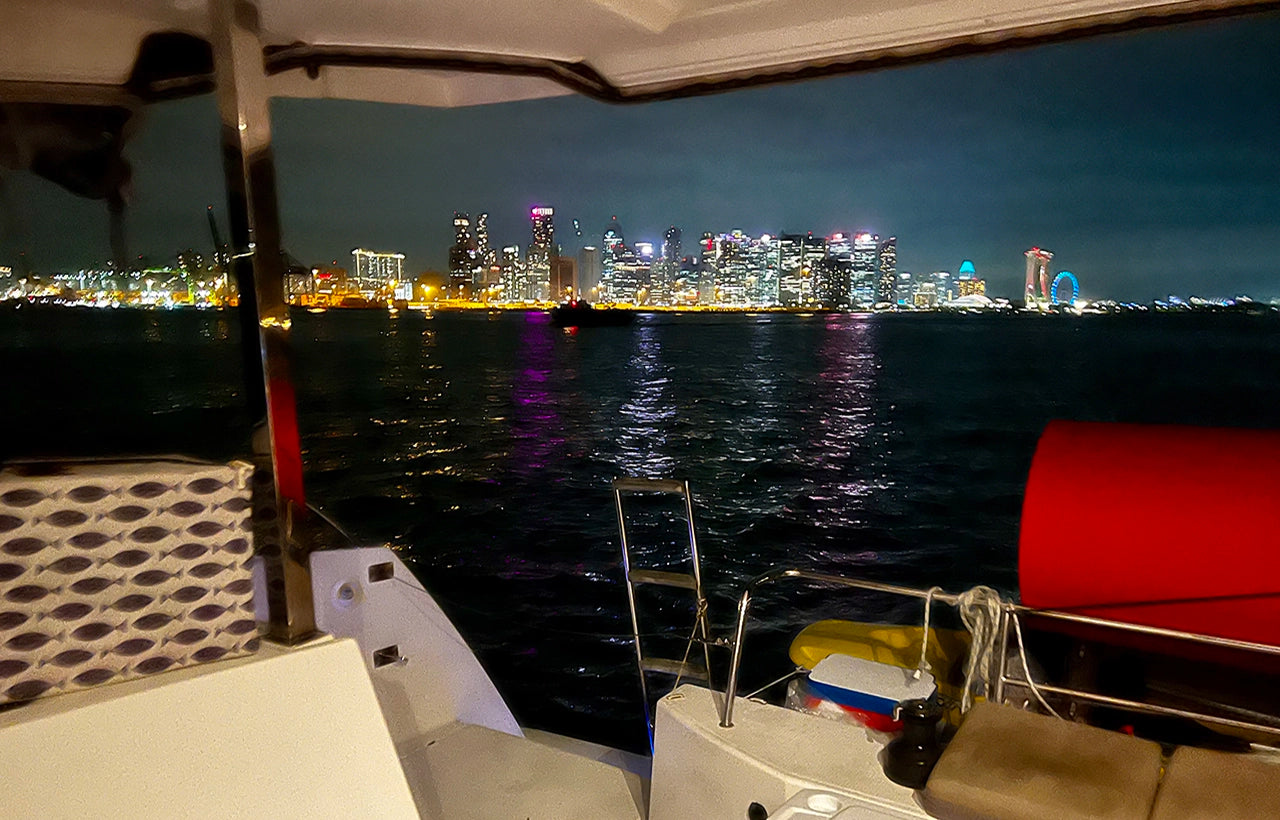 Singapore city skyline from stern of AQUAHOLIC