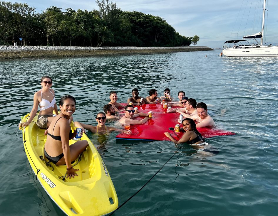 Group on Kayak & Watermat Enjoying The Sun & Sea